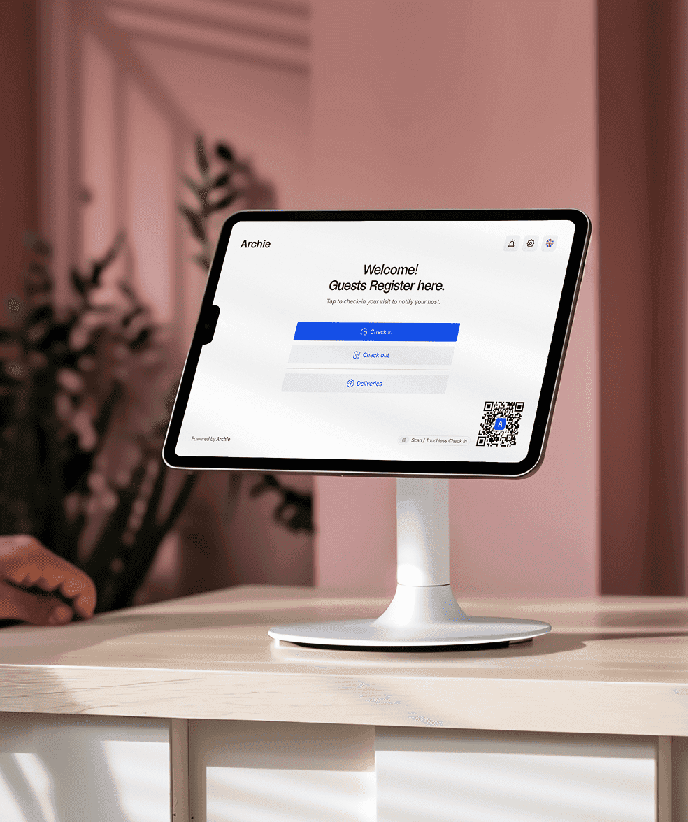 Guest check-in tablet screen with Archie Visitors app showing options to check in, check out, or mark deliveries.
